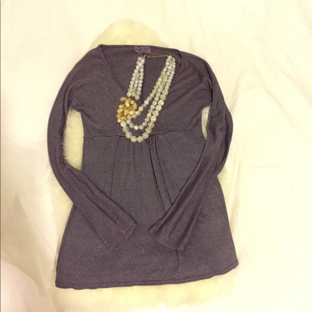 Shimmery, stretchy, bell-sleeved top